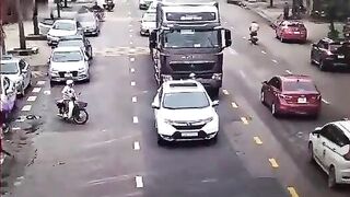 A Truck Hit An Elderly Woman Crossing The Road