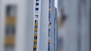 A Woman Climbed Out Of An Eighth-floor Window And Fell.