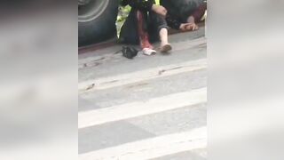 A Crushed Man Looks Out From Under The Steering Wheel Of A Truck 