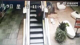 Old Woman Falls And Cannot Climb The Escalator