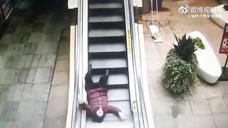 Old Woman Falls And Cannot Climb The Escalator