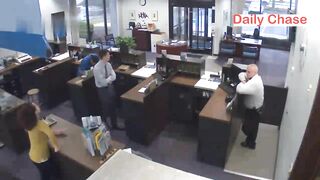 Bank Guard Shoots Robber 