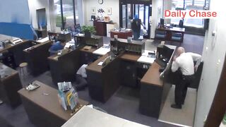 Bank Guard Shoots Robber 