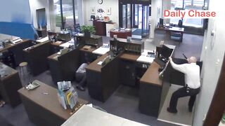 Bank Guard Shoots Robber 