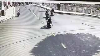 Two Motorcycles And A Car Collide 