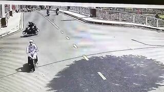 Two Motorcycles And A Car Collide 