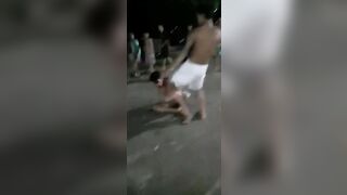 Crazy Bastard Kicks Downed Opponent In The Head 