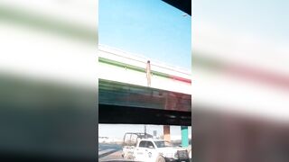 Dead Man Hanging On Bridge Railing 