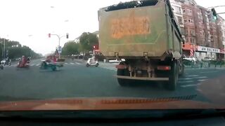 Chinese Garbage Truck Kills Scooter Rider