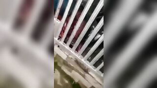 Man Squeezed Between Car And Fence 