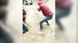 Man Screams Like A Pig As He Is Beaten With Sticks 