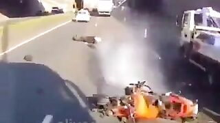 Motorcyclist Hits Parked Road Service Vehicle 