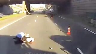 Motorcyclist Hits Parked Road Service Vehicle 