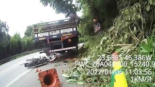 Motorcyclist Crashes Into Parked Truck 