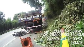 Motorcyclist Crashes Into Parked Truck 