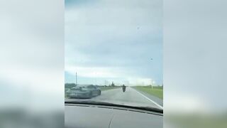 Biker Loses The Race 