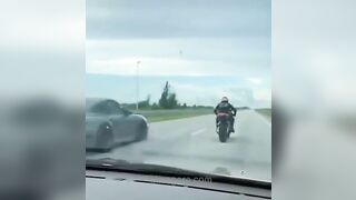 Biker Loses The Race 