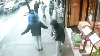 New York Pedestrians Seek Shelter After Gunman Shoots Man
