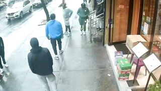 New York Pedestrians Seek Shelter After Gunman Shoots Man