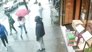 New York Pedestrians Seek Shelter After Gunman Shoots Man