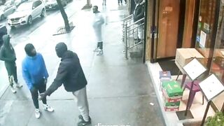 New York Pedestrians Seek Shelter After Gunman Shoots Man
