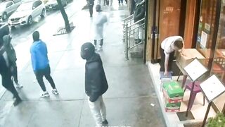 New York Pedestrians Seek Shelter After Gunman Shoots Man