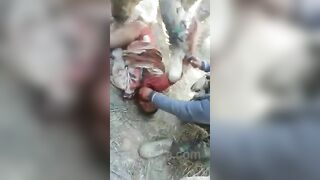 Soldiers From An Unknown Army Cut A Prisoner's Throat 