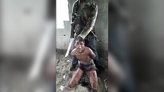 Iraqi Terrorist Beheads Hostage 