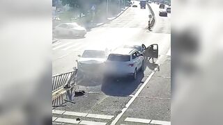 Driver Hit While Getting Out Of Car On Street
