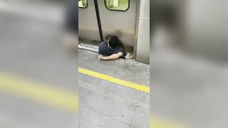 The Man Was Squeezed Between The Platform And The Train 