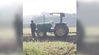 The Tractor Driver Fell Under The Wheels And Then Entered The T