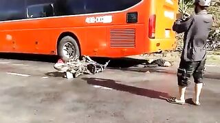 The Wheel Of A Bus Splits The Motorcyclist In Half 