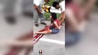 Woman's Legs Remain On Motorcycle 