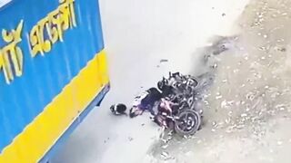Truck Runs Over Cyclist's Head 