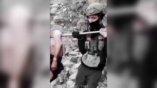 Turkish Soldiers Carry Broken Body Of PKK Fighter