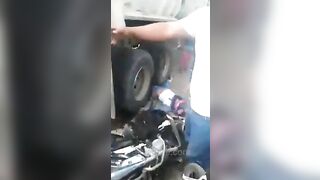 Motorcyclist Run Over By Truck Tire 