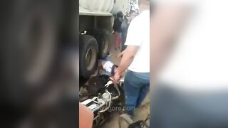 Motorcyclist Run Over By Truck Tire 