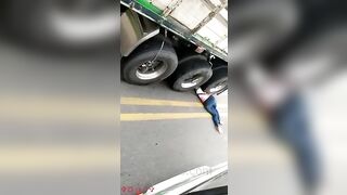 Woman Under Truck Wheels 