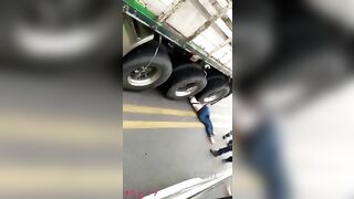 Woman Under Truck Wheels 