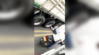 Woman Under Truck Wheels 