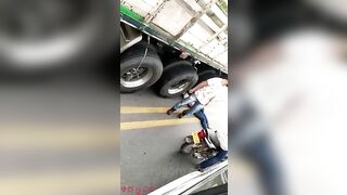 Woman Under Truck Wheels 