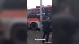 Woman Nailed To A Pole By Bus, Head Blown Off 