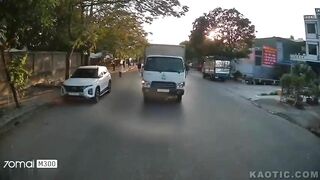 Vietnamese Moped Driver Is Out Of Luck After Being Thrown Under Dashcam Car