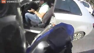 Cyclist Destroys His Bike While Trying To Beat Traffic Jam