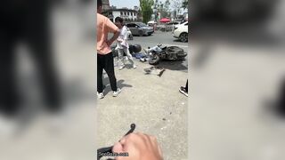 Bicyclist Without Helmet Knocks Down Other Cyclist At Intersection