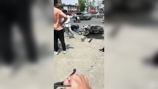 Bicyclist Without Helmet Knocks Down Other Cyclist At Intersection