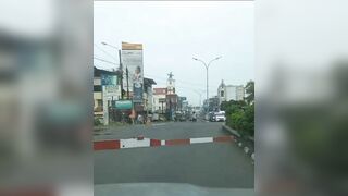 Cyclist Brakes While Crossing The Road In Front Of A Train