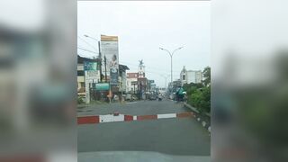 Cyclist Brakes While Crossing The Road In Front Of A Train