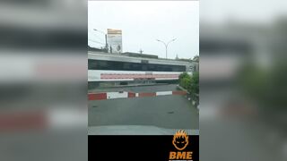 Cyclist Brakes While Crossing The Road In Front Of A Train