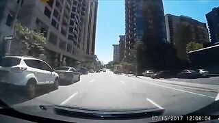 Cyclist Hit By Car After Running Red Light